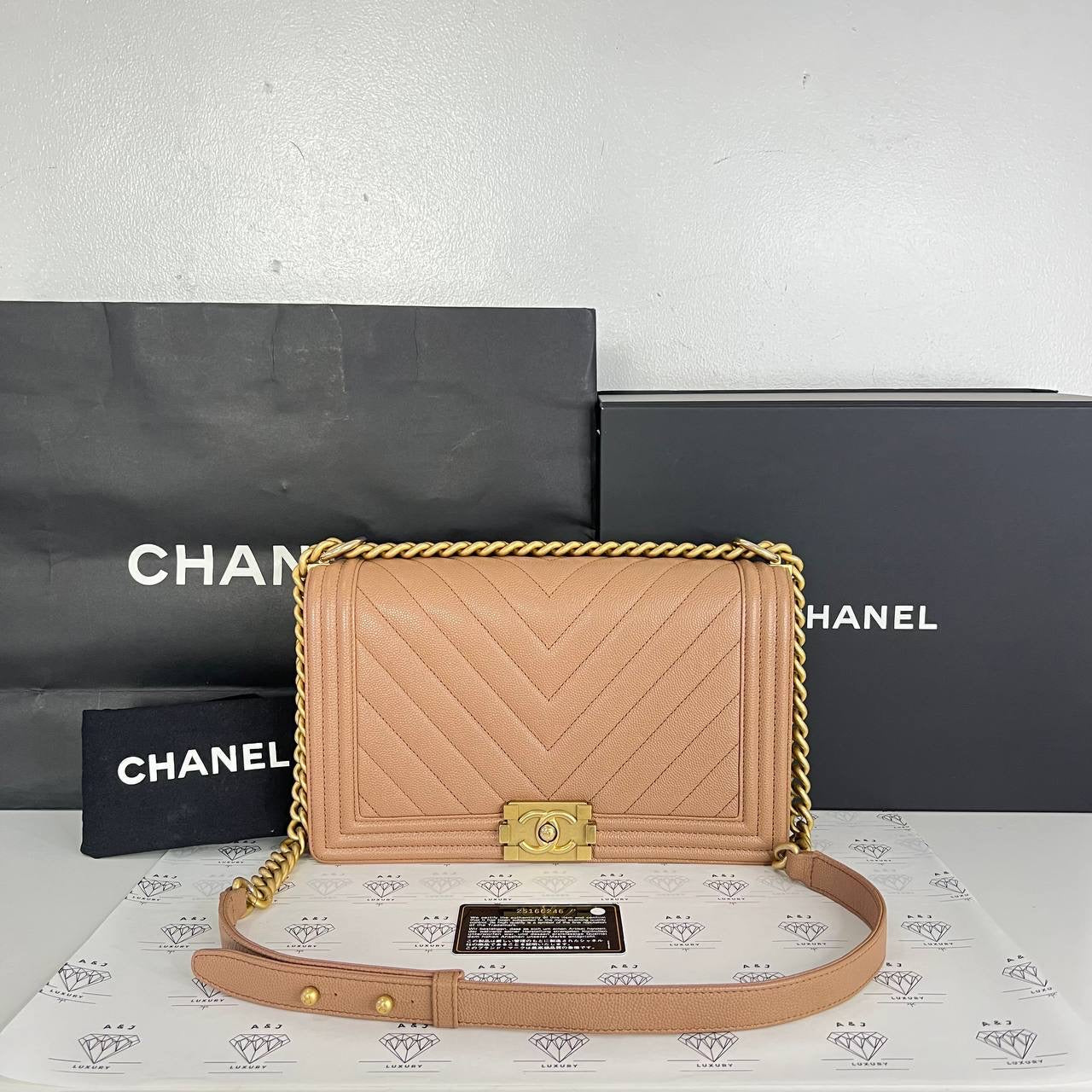 [PRE LOVED] Chanel New Medium Leboy Chevron in Caramel Caviar GHW (Series 25)