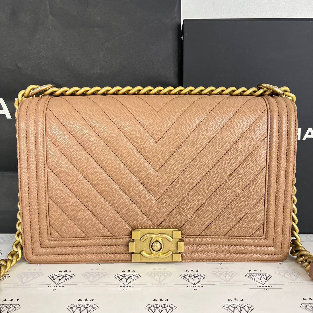 [PRE LOVED] Chanel New Medium Leboy Chevron in Caramel Caviar GHW (Series 25)