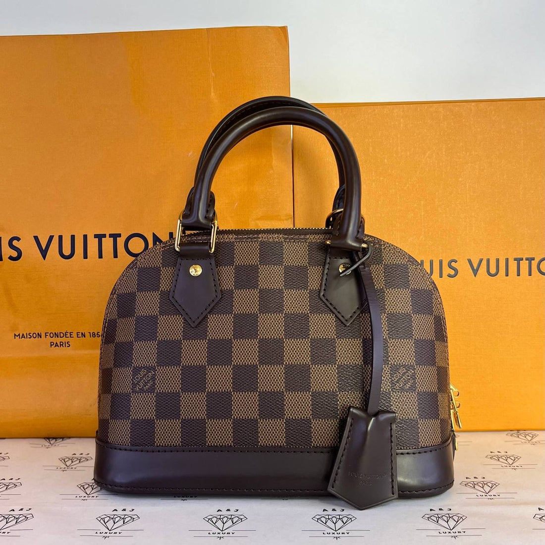 [PRE LOVED] Louis Vuitton Alma BB in Damier Ebene Canvass (microchipped)