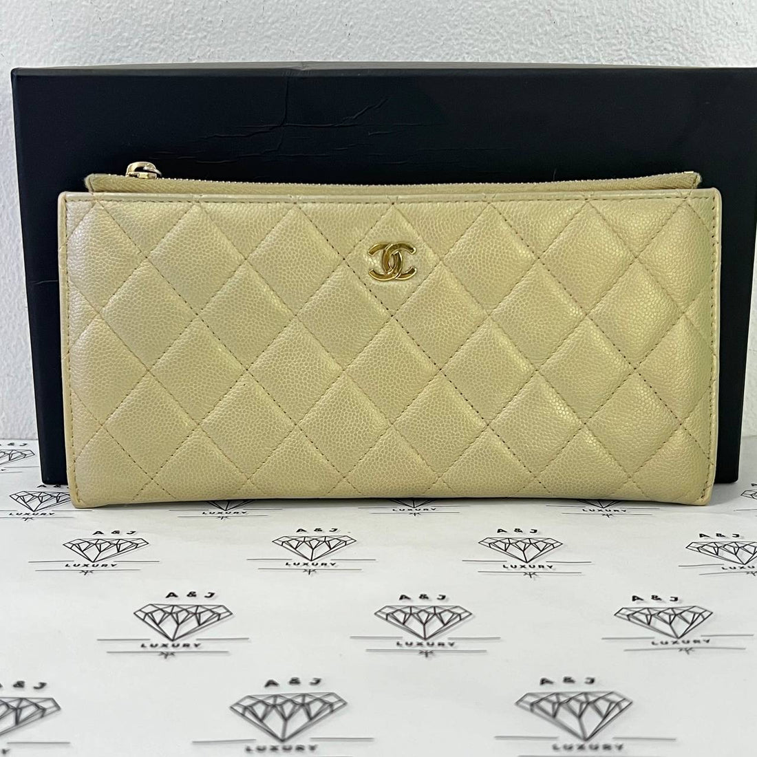 [PRE LOVED] Chanel Zipped Pouch in Gold Caviar Leather GHW (Series 22)