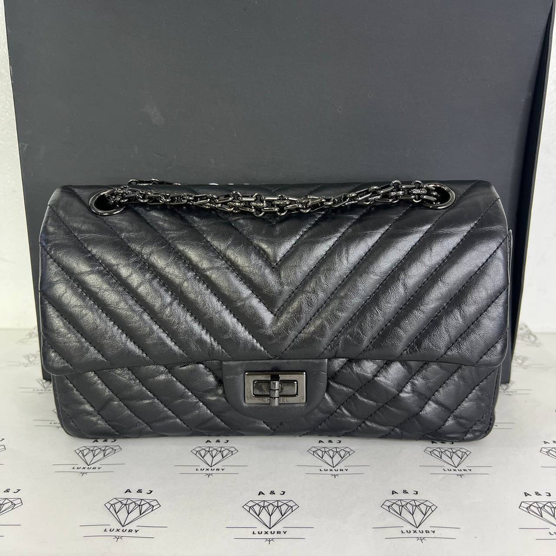 [PRE LOVED] Chanel Reissue 2.55 in So Black Crinkled Calfskin Leather (Series 26)