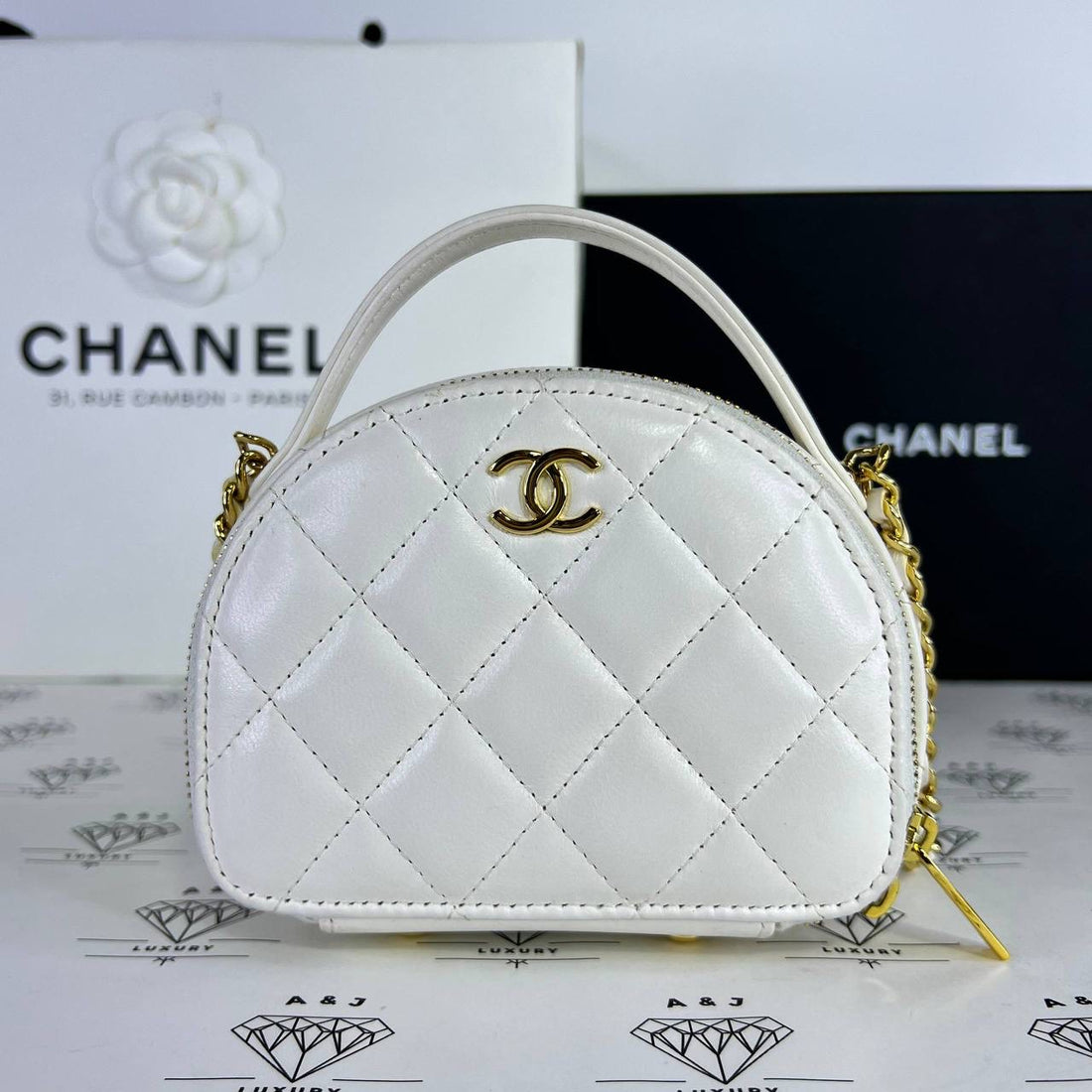 [PRE LOVED] Chanel Half-Moon Mini Vanity in White Lambskin Leather GHW (microchipped)
