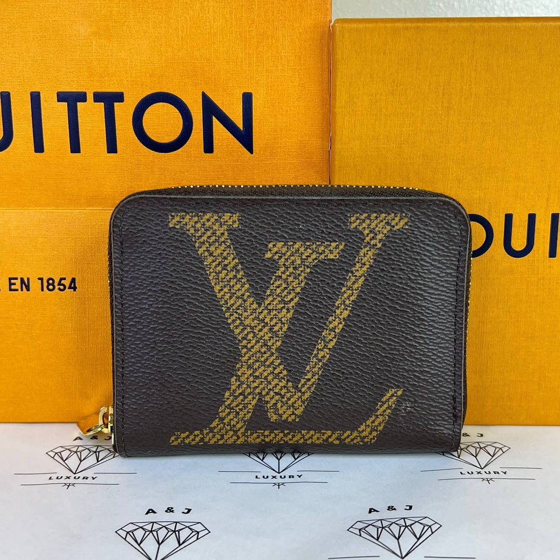 [PRE LOVED] Louis Vuitton Zippy Coin Purse in Reverse Monogram Canvass (microchipped)