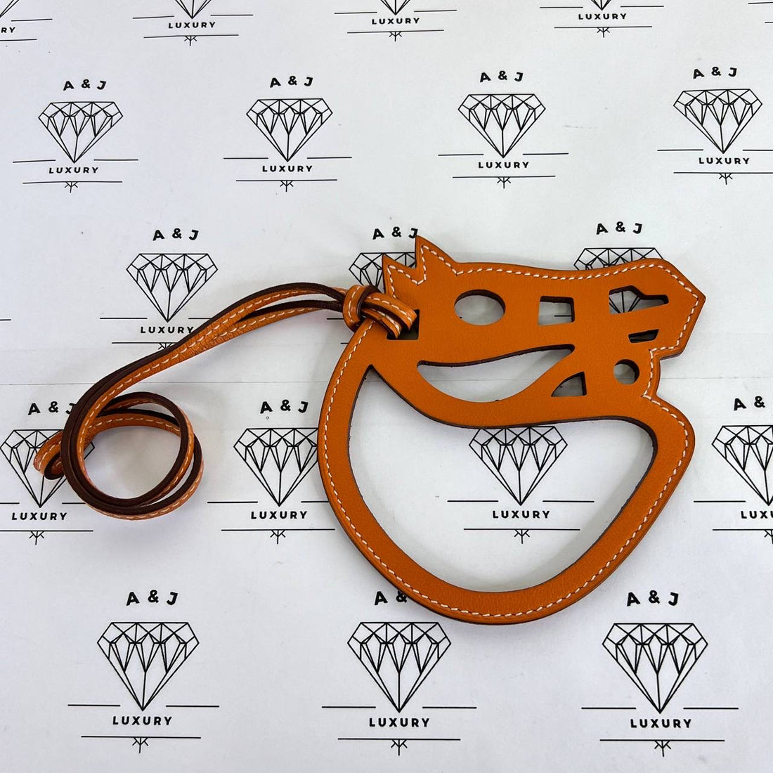 [PRE LOVED] Hermes Paddock Cheval Horse Bag Charm in Orange