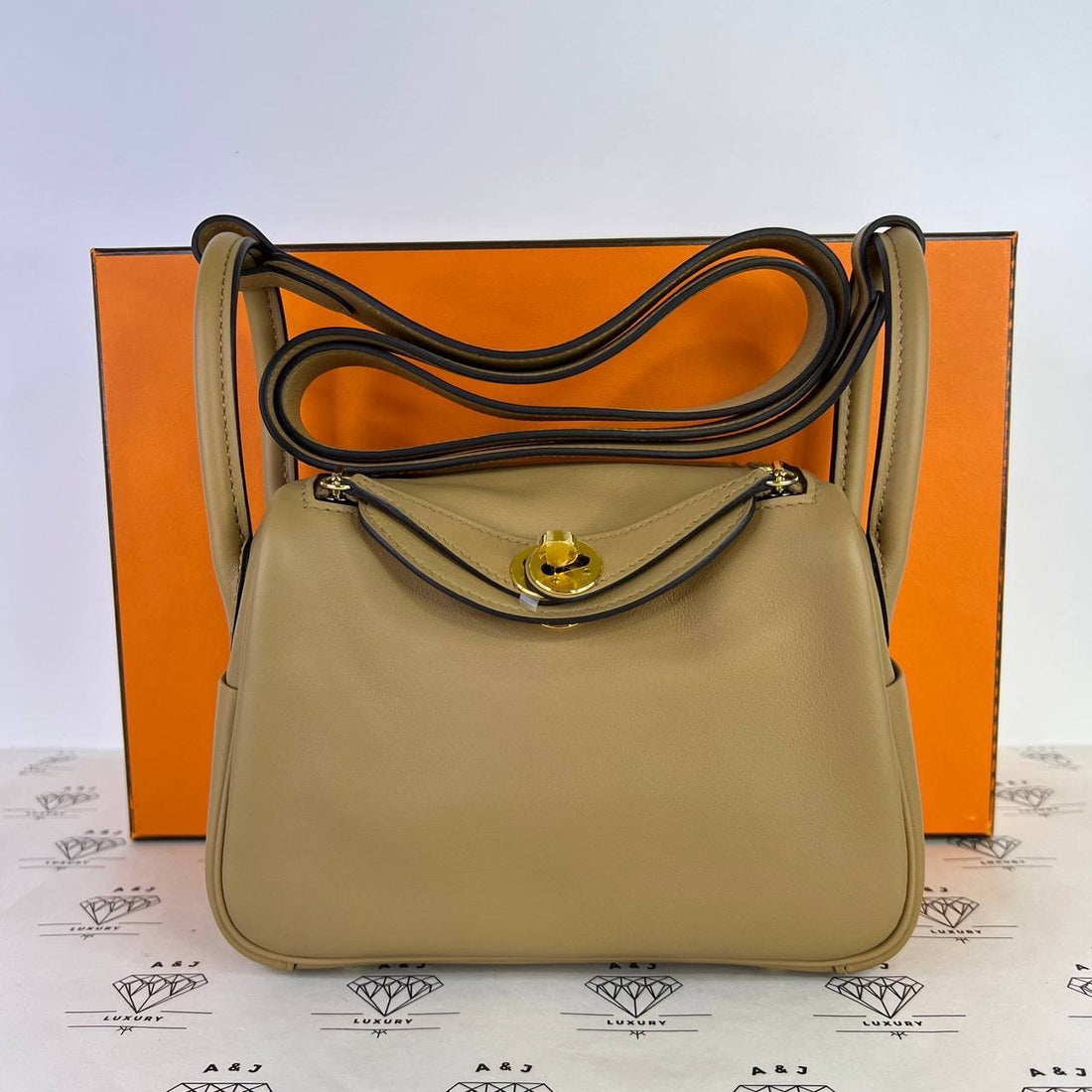 [PRE LOVED] Hermes Mini Lindy Verso in Chai/Mauve Sylvestre Swift Leather GHW (Stamp W - 2024)