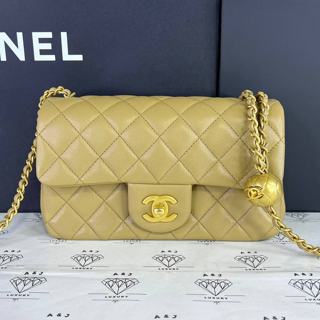 [PRE LOVED] Chanel Mini Rectangle Flap Pearl Crush in Dark Beige Lambskin Leather GHW (microchipped)