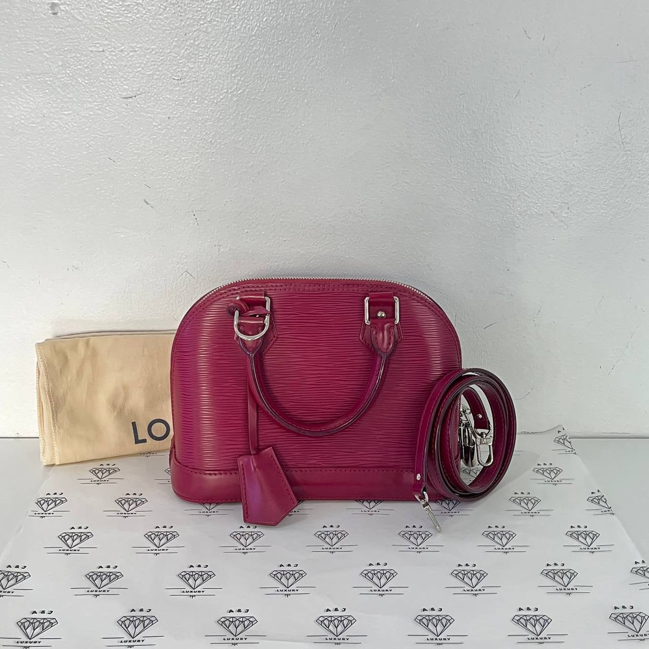 [PRE LOVED] Louis Vuitton Alma BB in Fuchsia Epi Leather SHW (FL0135)