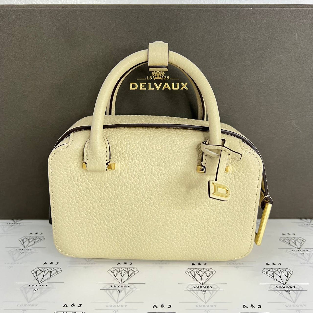 [PRE LOVED] Delvaux Cool Box Nano in Angora Taurillon Soft Leather GHW