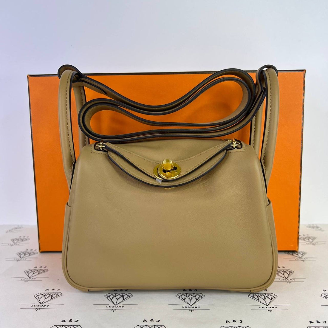 [PRE LOVED] Hermes Mini Lindy Verso in Chai/Mauve Sylvestre Swift Leather GHW (Stamp W - 2024)