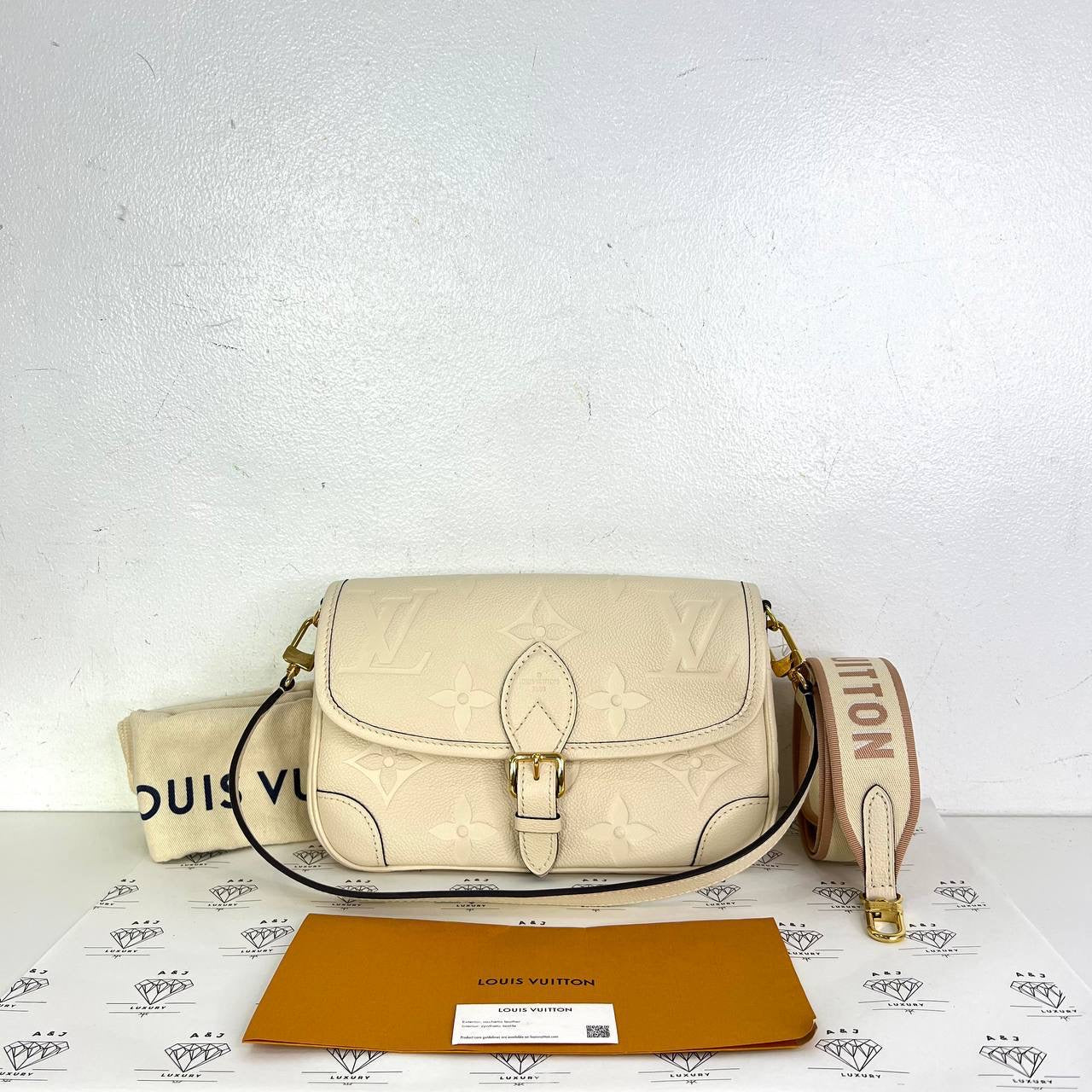 [PRE LOVED] Louis Vuitton Diane in Creme Empreinte Leather (microchipped)