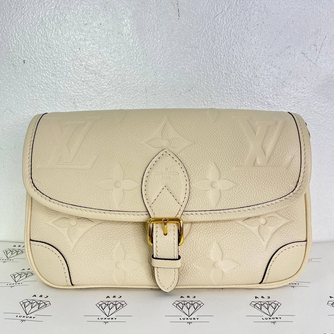 [PRE LOVED] Louis Vuitton Diane in Creme Empreinte Leather (microchipped)