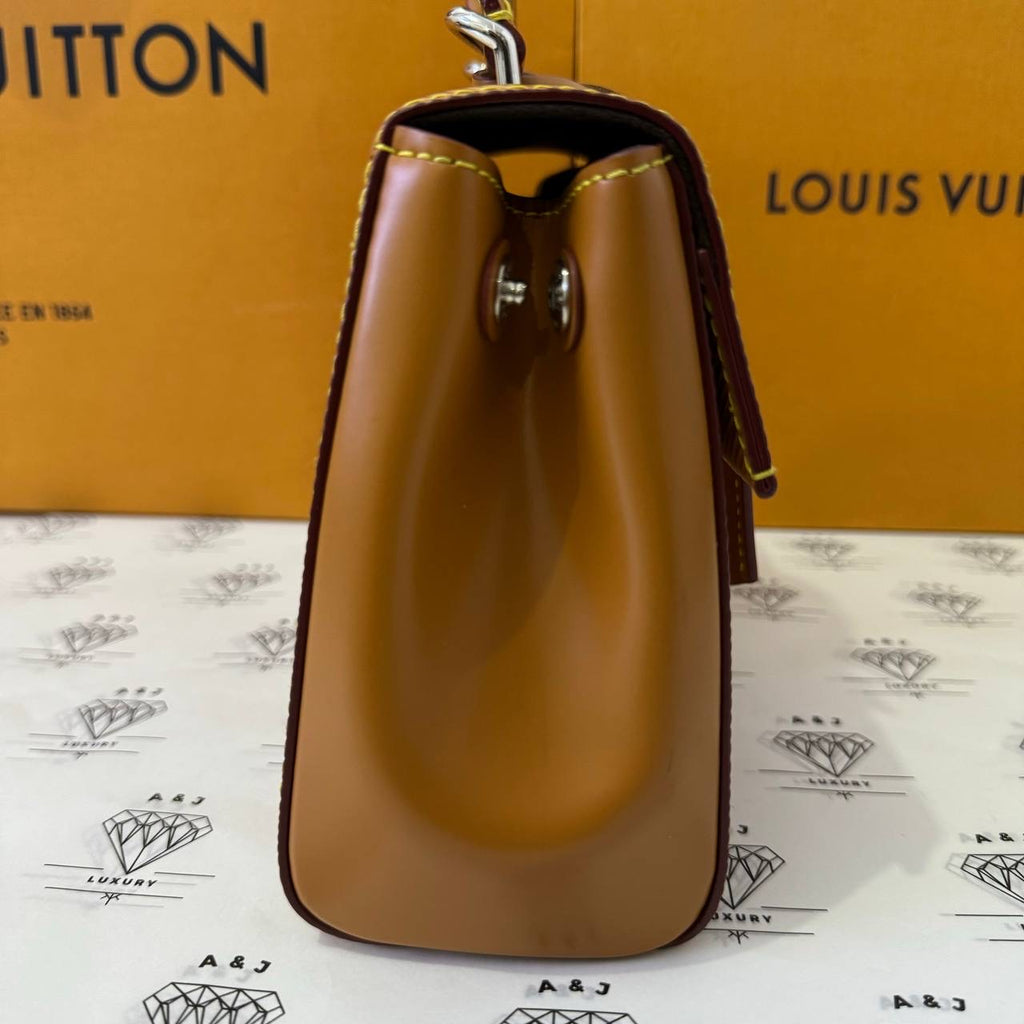 [PRE LOVED] Louis Vuitton Clunny Mini in Gold Miel Epi Leather with initials PSG (microchipped)