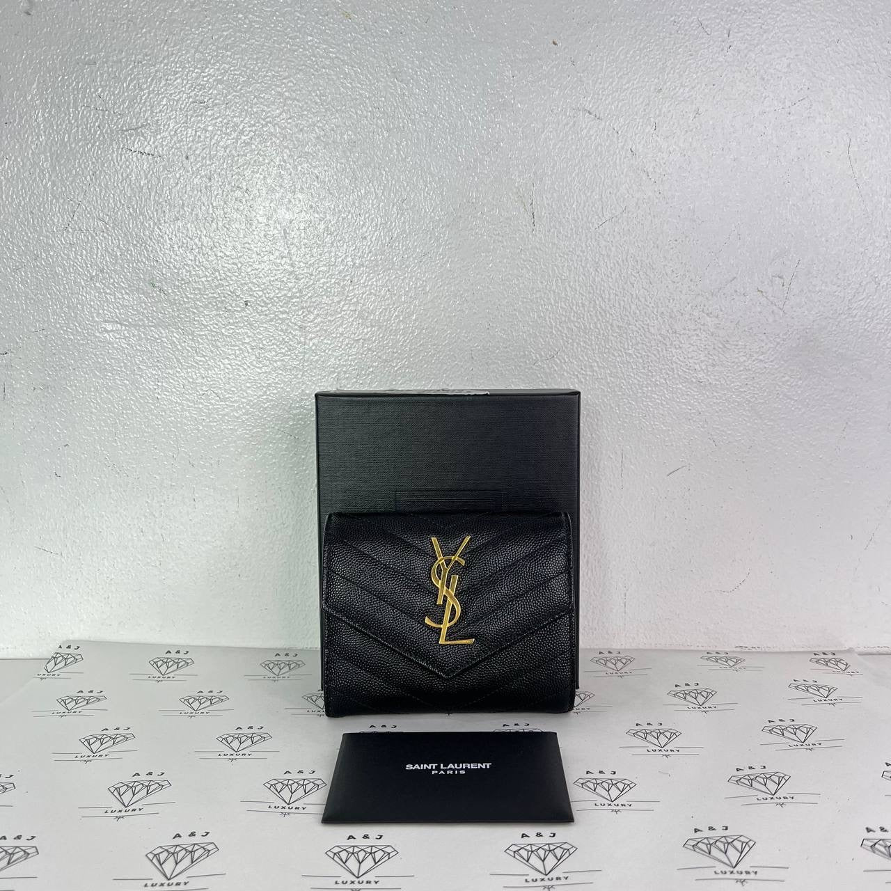 [PRE LOVED] YSL Trifold Compact Wallet in Black Grain De Poudre GHW