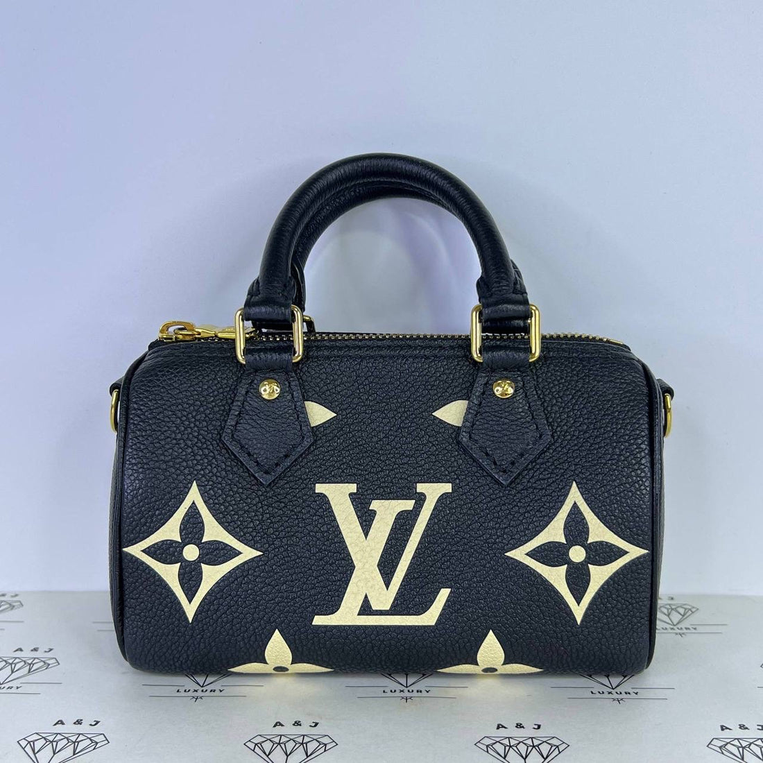 [PRE LOVED] Louis Vuitton Nano Speedy in Bicolor Black/Creme Empreinte Leather (microchipped)