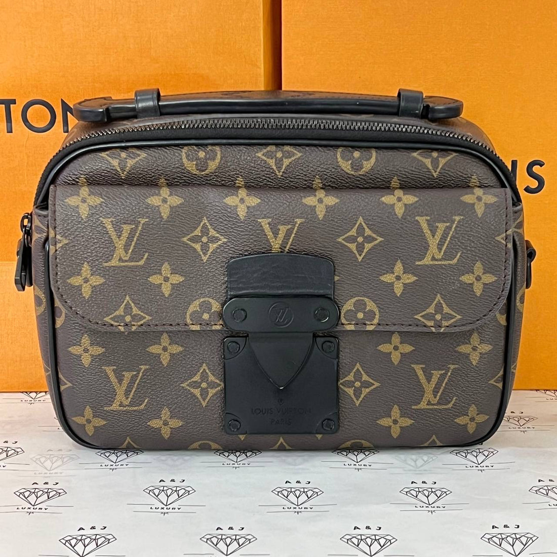 [PRE LOVED] Louis Vuitton S Lock Messenger Bag in Monogram Canvass (microchipped)