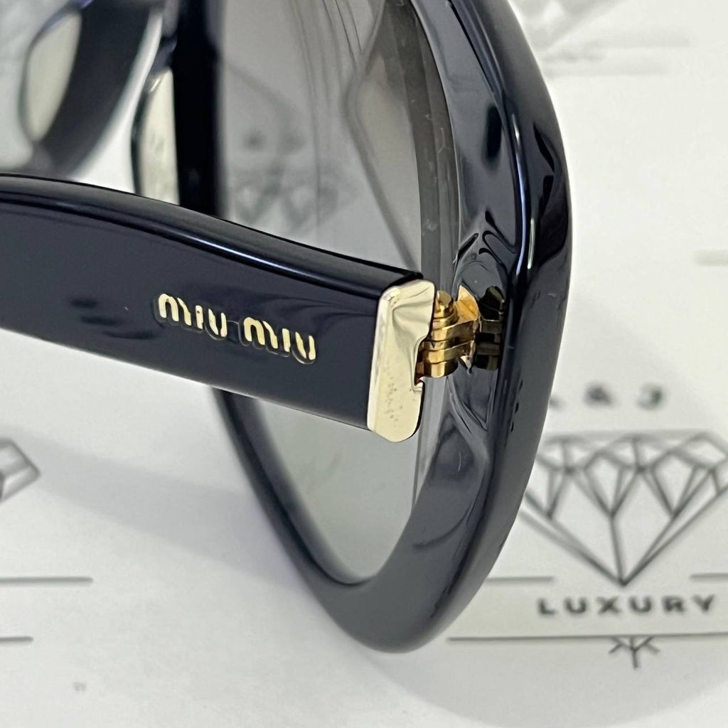 [PRE LOVED] Miu Miu 1AB-3M1 Sunglasses in Black