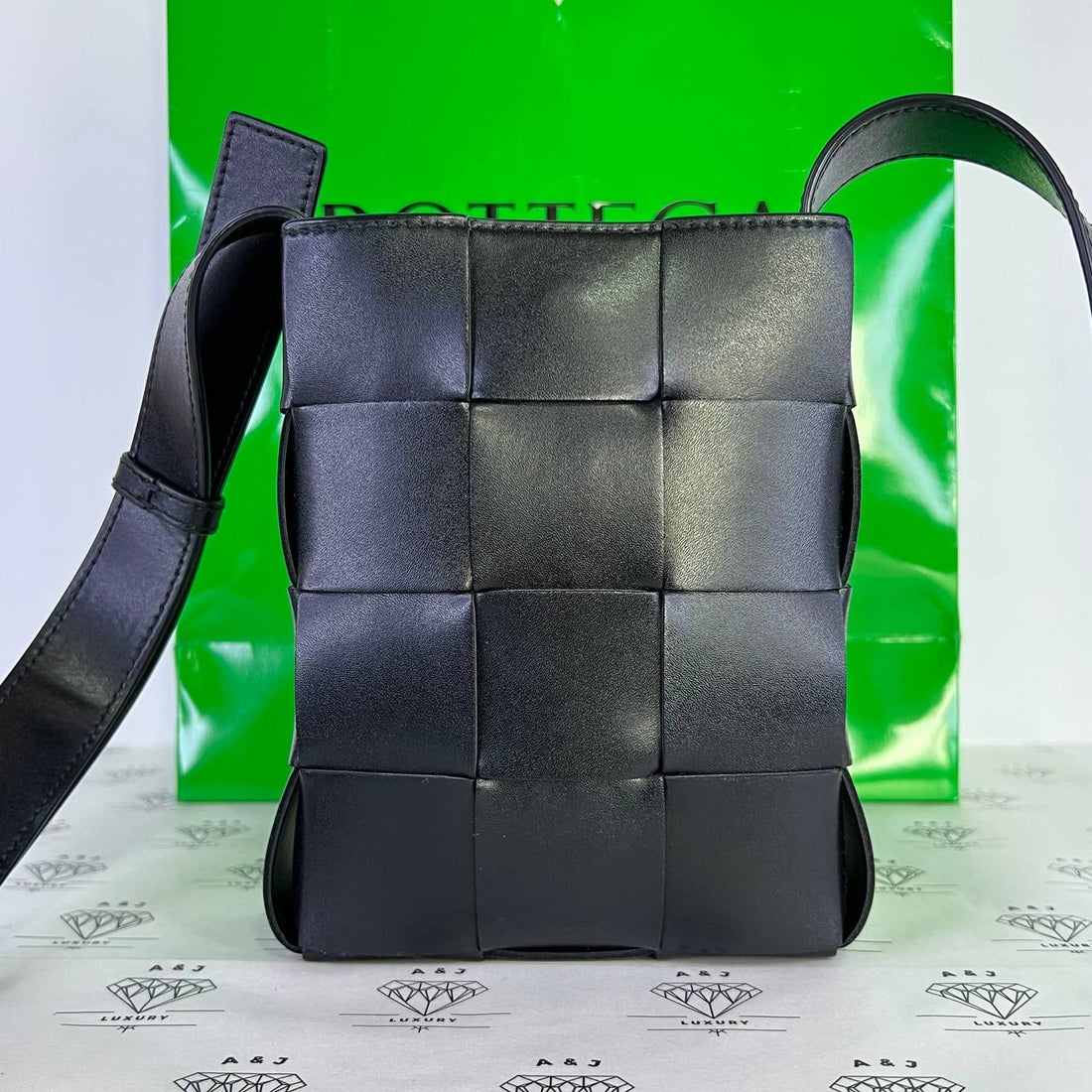 [PRE LOVED] Bottega Veneta Cassette Phone Holder in Black