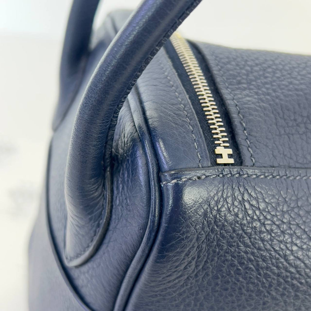 [PRE LOVED] Hermes Lindy 26 in Bleu Nuit Clemence Leather PHW (Stamp Square M - 2009)