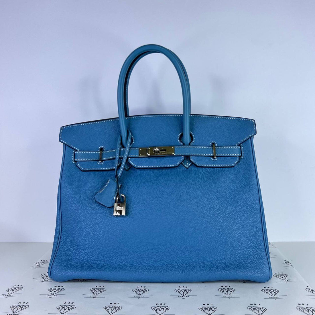 [PRE LOVED] Hermes Birkin 35 Retourne in Blue Jean Togo Leather PHW (Stamp F Square - 2002)