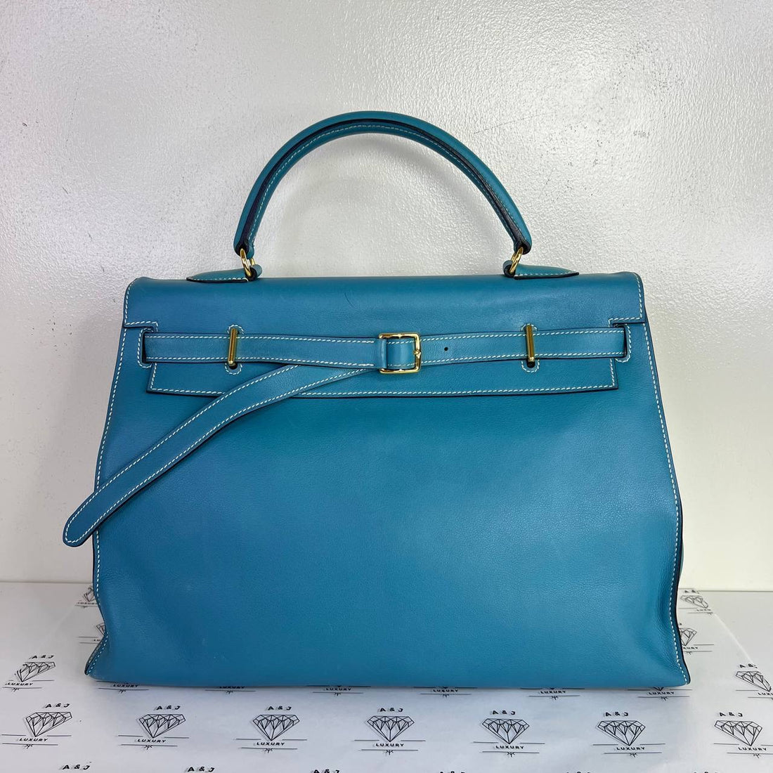 [PRE LOVED] Hermes Kelly Flat 35 in Bleu Jean Swift Leather GHW (Stamp K Square - 2007)