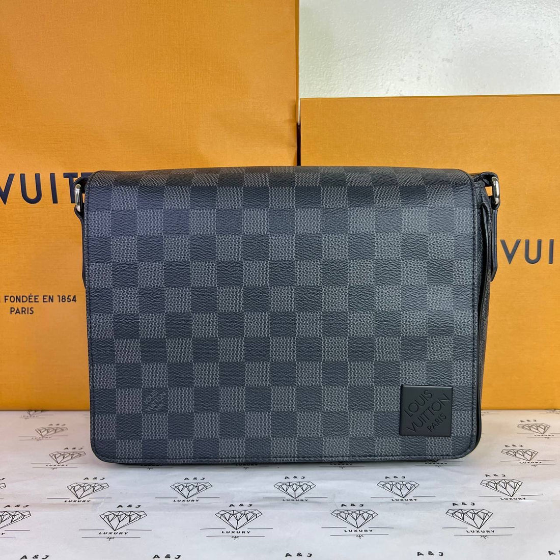 [PRE LOVED] Louis Vuitton District PM in Damier Graphite Canvass (microchipped)