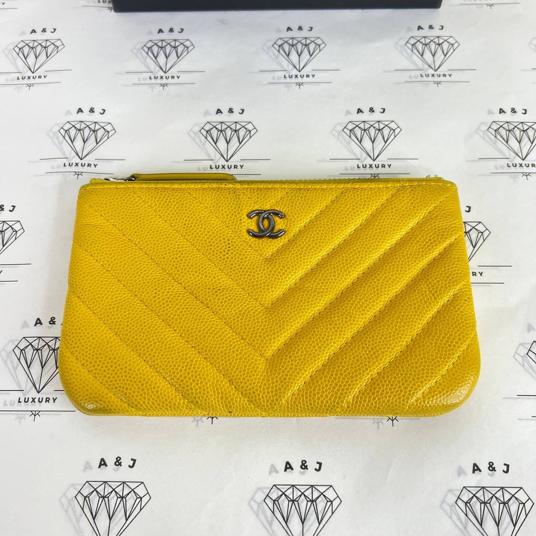 [PRE LOVED] Chanel Mini O Case in Yellow Caviar Leather RHW (Series 24)