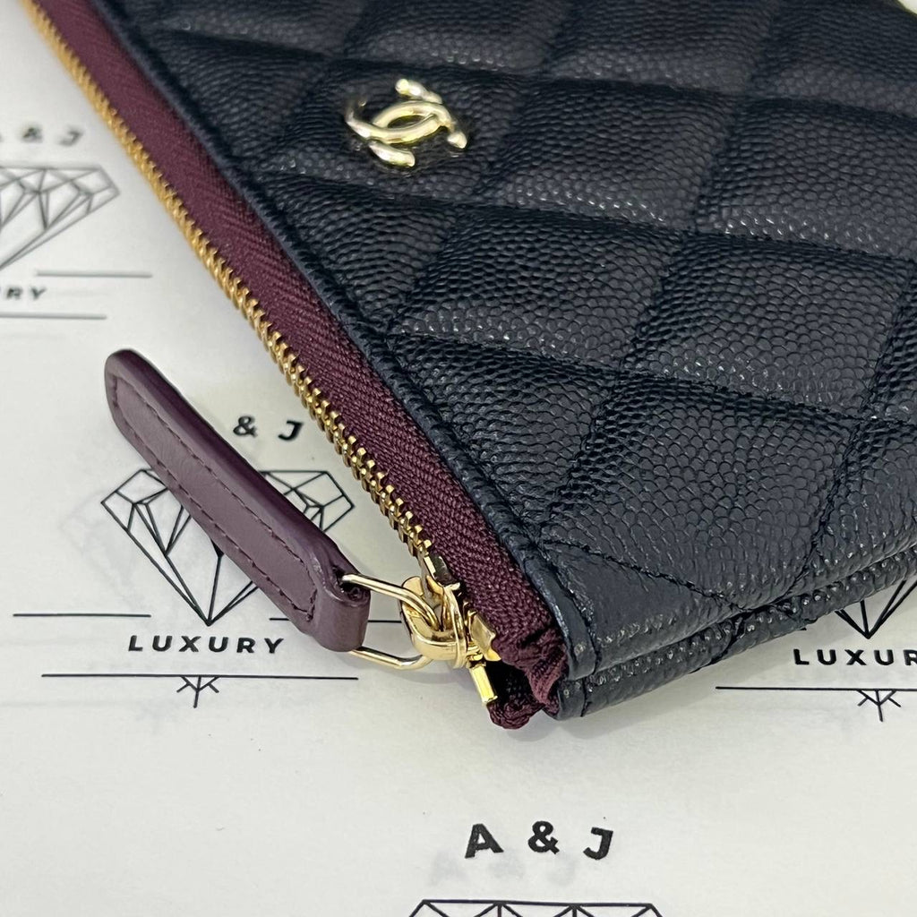 [PRE LOVED] Chanel Mini O Case in Black Caviar GHW (microchipped)