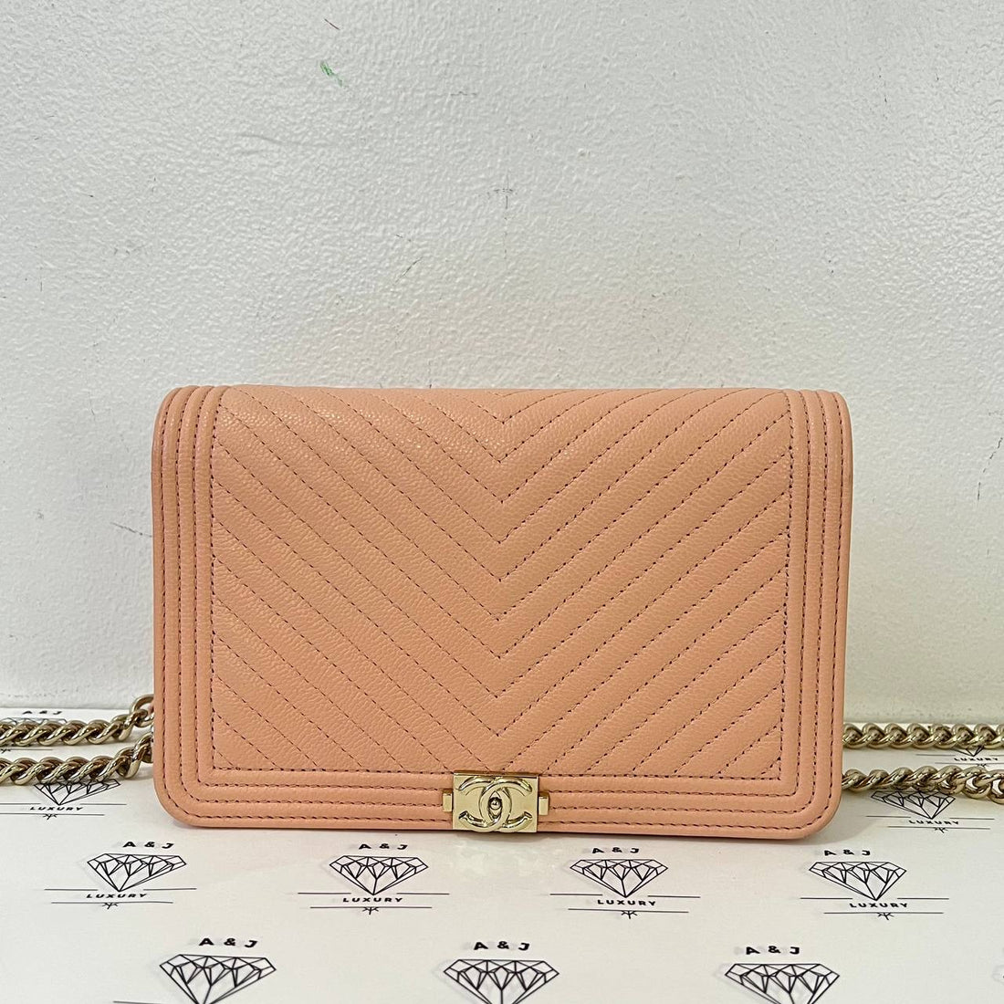 [PRE LOVED] Chanel Leboy Wallet on Chain in Peach Chevron Caviar Leather GHW (microchipped)