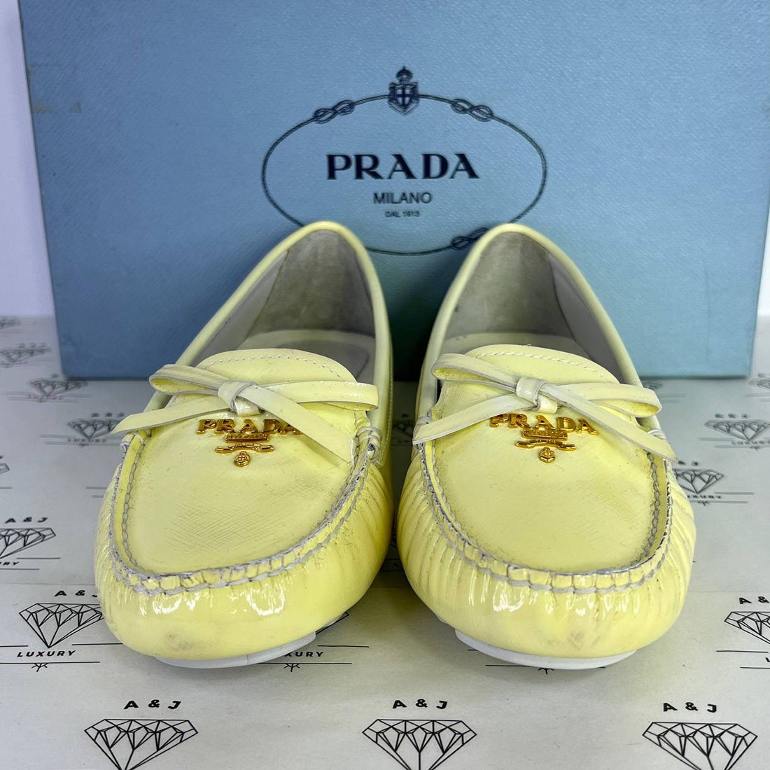 [PRE LOVED] Prada Bow Slip On Loafers in Light Yellow Patent Leather Size 37EU