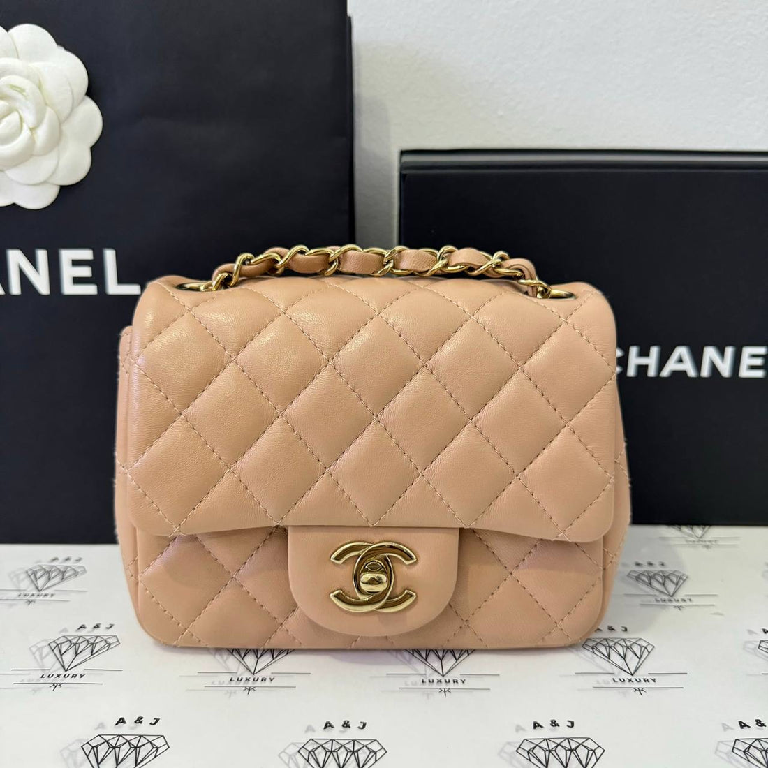 [PRE LOVED] Chanel Classic Mini Square in Beige Lambskin Leather GHW (microchipped)