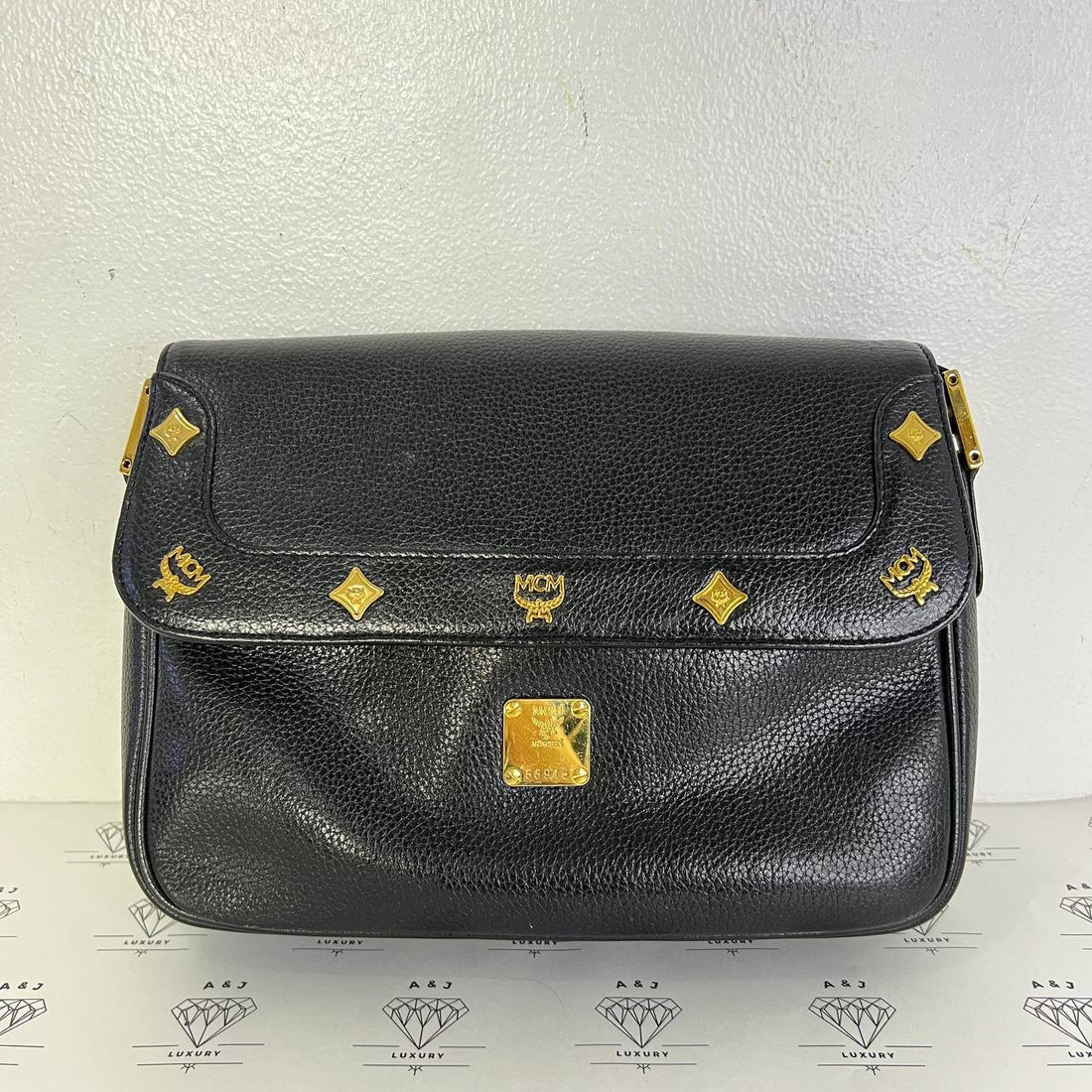 [PRE LOVED] MCM Studded Sling Bag in Black GHW