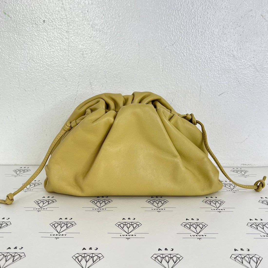 [PRE LOVED] Bottega Veneta Mini Pouch Sling Bag in Beige