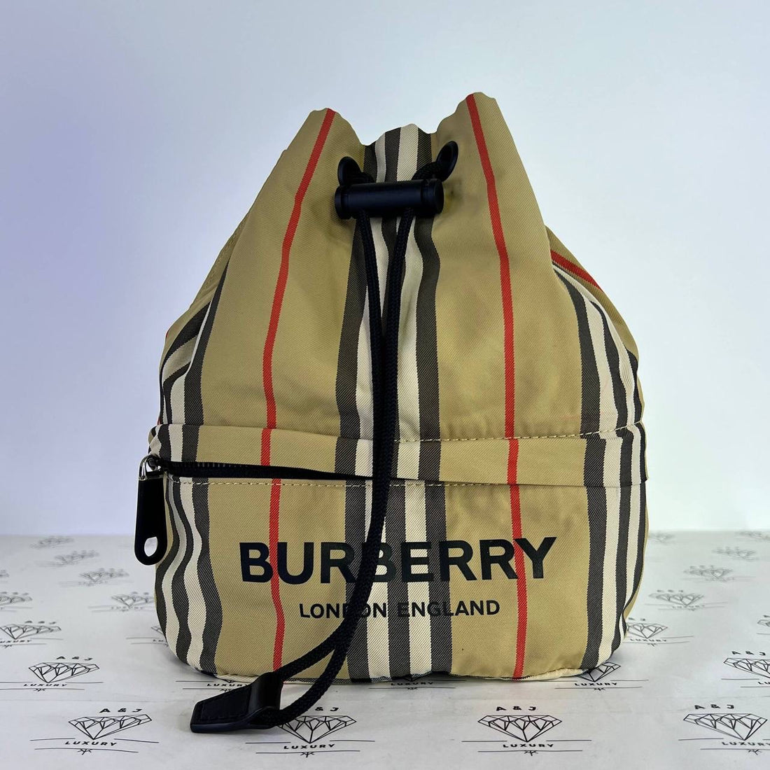 [PRE LOVED] Burberry Mini Drawstring Pouch in Brown